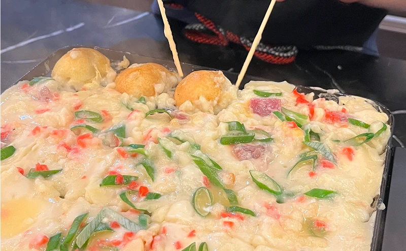 Cooking takoyaki together
