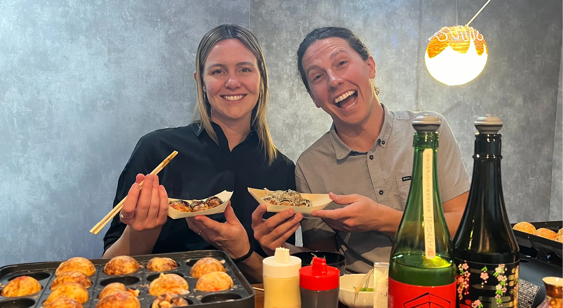Osaka sake tasting and takoyaki cooking experience